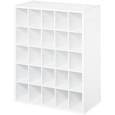 a white shelving unit with twelve compartments on each side and one section open to show the