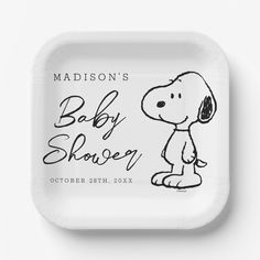 a paper plate with a drawing of a snoopy dog on it and the words baby shower written in black ink