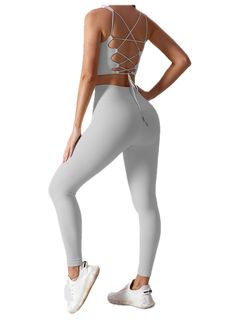 Upgrade your workout wardrobe with our High-Waist Ribbed Legging Yoga Set. Made for comfort and style, this sportswear set is perfect for gym, sports, and fitness activities. The high-waist design provides support and coverage while the ribbed texture adds a touch of uniqueness. Elevate your yoga game with our Two Pieces Yoga Sets for Women. Compressive Solid Color Sportswear Activewear, Solid Color Gym Sportswear Activewear, Solid Color Gym Sportswear, Solid Color Sportswear For Gym, Solid Compression Activewear Athleisure, Solid Compression Athleisure Activewear, Solid Compression Activewear For Athleisure, Solid Activewear With Medium Support For Gym, Compressive Solid Activewear For Gym