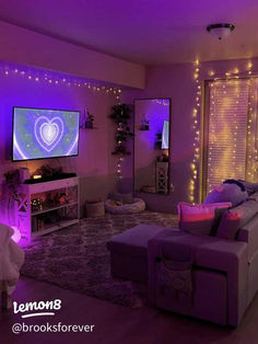 a living room filled with furniture and purple lights on the wall above it is a flat screen tv