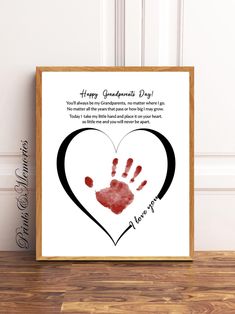 a handprinted heart with the words happy grandparents day on it