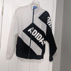 Adidas Batwing Black And White Equipment Jacket Size Small, Zipper Closure. I Have The Ticket, It Is Circa 09/16, Never Worn. Runs Roomy Due To The 80s Style Oversized Design. Black And White Jacket, 80s Style, Adidas Jackets, White Jacket, White Adidas, The 80s, 80s Fashion, Adidas Women, Adidas Jacket