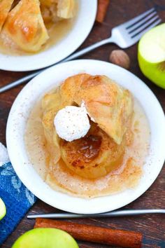 two white plates topped with apple pie