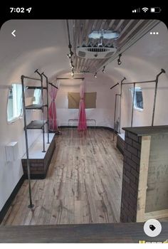 the inside of an airstrip with bunk beds and ladders