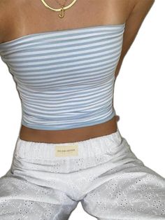 White Fitted Bandeau Top, Fitted Strapless Summer Tops, Spring Seamless Stretch Tops, Spring Stretch Seamless Tops, Spring Bandeau Stretch Crop Top, Blue Fitted Bandeau Tank Top, Fitted Blue Bandeau Tank Top, Stretch Bandeau Crop Top For Spring, Spring Stretch Bandeau Crop Top