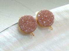 You will receive a pair of quality druzy drusy ear post in the picture, we set them with 18K gold over sterling silver ear post and ear back, Beautiful hand picked natural brown druzy with a tone of red druzy cyrstal!! Natural druzy crystal allow the light to pass through and showcase the brilliant crystal which sparkles. size approximately 13.5x10.5mm including loop, drusy is 10.5mm, 2.5mm closed ring,1.5mm hole id Listing: One pair complete with ear back / nuts More drusy druzy here: http://ww Druzy Crystal, Bird Charm, Feather Pendant, September Birthstone, Earring Findings, Natural Brown, Crystal Points, Druzy, Gold Vermeil