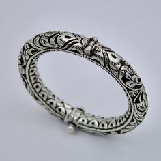 Weight: 63.2 Grams Size: IND 2.5  7 Inches Width: 10.8 mm Hallmark: 925 Sourced from Tribal villages in Rajasthan, India Traditional Handwork called Chitai (engraving) has been done on the bangles Screw Lock for utmost safety. Follow our shop to view more treasures like this: https://www.etsy.com/shop/ORNOMOON?ref=seller-platform-mcnav&page=2#items Hippie Bracelets, Hand Engraving, Silver Fashion, Hippie Boho, Bangle Bracelets, Favorite Jewelry, Silver Jewelry, Jewelry Bracelets, Bangles