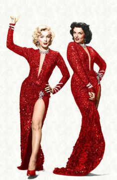 two women in red sequin dresses posing for the camera