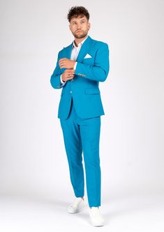 Dress to impress in the Hudson Sapphire Blue Stretch Suit! This suave custom suit is made from a stretch cotton fabric for a look that's both comfortable and vibrant. With its radiant hue, you're sure to turn heads at any event! So suit up - it's time to shine! Tailored Blue Summer Suits, Blue Cotton Notch Lapel Suit, Fitted Blue Suits For Spring, Tailored Blue Cotton Suit, Slim Fit Cotton Suit For Spring, Spring Slim Fit Cotton Suits, Fitted Cotton Sets With Notch Lapel, Tailored Blue Cotton Blazer, Blue Cotton Business Suits