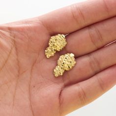 Look stylish with these Nugget Earrings in 10k Yellow Gold. The height from top to bottom is 0.77" and the width is 0.46". These shiny, sparkling Nugget Earrings have a 10k Stamp. Perfect for everyday wear, a great addition to your Jewelry Collection, or a great gift for him or her. Luxury Nugget Jewelry For Anniversary, Classic Luxury Nugget Jewelry, Gold Nugget Earrings, Nugget Earrings, Clean Gold Jewelry, Golden Nugget, Expensive Jewelry Luxury, Gold Nugget, Expensive Jewelry