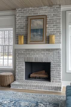 a living room filled with furniture and a fire place in front of a painting on the wall