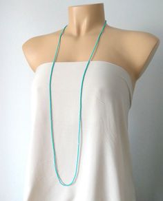 "This is a one strand beaded turquoise necklace, with NO CLASP, and can be worn in multiple ways, as shown in pictures. ❤ SIZES This item is one size fits all. ❤ PROCESSING AND SHIPPING Most orders are made and shipped out in one business day. Please check delivery timeframes for your location on the description below. ❤ CUSTOM ORDERS If you like this item in a different color, send me a message indicating: color, size and quantity needed. I will send you a link for a \"custom order\" and you'll Elegant Beaded Turquoise Necklace For Beach, Colorful Beads Turquoise Necklace For Beach, Summer Turquoise Beaded Necklaces With Colorful Beads, Turquoise Dainty Beaded Necklace, Turquoise Long Beaded Chain Necklace, Beach Turquoise Necklace With Round Beads, Turquoise Beaded Chain Necklace For Summer, Turquoise Necklace With Tiny Beads For Beach, Turquoise Beaded Chain Necklace For Beach