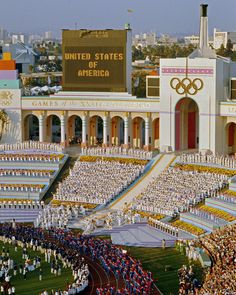 an aerial view of the olympic games in los angeles, with spectators and athletes lined up to watch