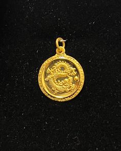 Made in solid 24k gold. Not plated Pendant measures approximately 20mm and weighs around 3.8g The Dragon is the 5th of the 12 Chinese zodiacs. They are confident, intelligent, enthusiastic. The Dragon also symbolizes power, nobleness, honor, luck, and success in traditional Chinese culture. There are born on the years: 1952, 1964, 1976, 1988, 2000, 2012, 2024 On the back is the character XingFu, representing good blessings and good luck. 22k Yellow Gold Medallion Jewelry, Formal Gold Round Disc Jewelry, Gold Plated Jewelry With Shiny Finish, Round Gold Plated Jewelry With Shiny Finish, Gold Plated Round Jewelry With Shiny Finish, Gold Jewelry With Shiny Finish, Gold Amulet Jewelry With Polished Finish, Gold Round Jewelry With Shiny Finish, Gold Coin Jewelry For Anniversary