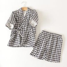 These gingham kimono kids pajamas are a fun and classy alternative to traditional nightwear. The top has a cross over top and the shorts are elastic waisted for comfort. Put your little one in their most comfortable state with this easy to wear item. Material: Cotton Summer Gingham Sleepwear For Loungewear, Cotton Gingham Loungewear Sets, Gingham Cotton Loungewear Sets, Summer Gingham Pajama Shorts, Summer Gingham Cotton Sleepwear, Summer Gingham Sleepwear, Kids Kimono, Kids Gingham Shirt, Summer Cotton Sleepwear For Babies