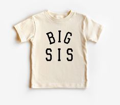 Elevate sisterly pride with our Big Sis Natural Shirt, designed for big sisters who lead with love and guidance. Crafted from soft and eco-friendly cotton, this shirt offers comfort and sustainability with a touch of simplicity. The natural color adds a timeless charm, perfect for family gatherings, special occasions, or everyday adventures. Key Features: Soft and Eco-Friendly Cotton: Ensures comfort and sustainability. Charming Design: Celebrates the special bond of sisterhood. Natural Color Pa Lead With Love, Big Sister T Shirt, Big Sisters, Big Sister Little Sister, Nature Color Palette, Big Sis, Everyday Adventures, Everyday Activities, Stretch Shorts