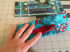 someone is making a minecraft wallet out of fabric and some other things to sew