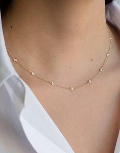 14k yellow gold necklace with 10 bezel diamonds around the neck line. Uber chic and dainty, wear it by itself or layered. Comes with a 16"- 17" -18" adjustable chain Size of Bezel Diamond: Approx. 0.03 (ct. tw) Diamond Quality: VS Total Weight: Approx. 2 grams Rush orders ship in 2-4 business days Comes gift ready in a custom Zoe Lev jewelry box Diamond By The Yard, Sterling Silver Star Earrings, Delicate Jewellery, Simple Chain, Whimsical Jewelry, 14k Yellow Gold Necklace, Solid Gold Necklace, Sterling Silver Drop Earrings