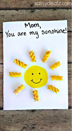 a card with the words mom, you are my sunshine on it and an image of a smiling sun