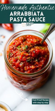 homemade authentic arabica pasta sauce in a glass jar with a spoon on the side