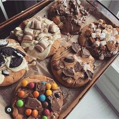 a tray filled with lots of different types of cookies