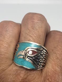 Cool Vintage Rock and Roll star men's ring Genuine stone Southwestern inlay Nice heavy ring, Silver white bronze Does not tarnish Unused stock from the 1980's I have an assortment of sizes from 8-14 We have some half sizes. My jeweler can custom resize for $10-$20 fee Please add your size to the order in a message and I will send the size you require. If I am out of stock in your size, I will list the ones I have available for replacement. If I am sold out in the sizes you would prefer, I will c Traditional Silver Turquoise Ring With Inlay, Americana Vintage, Native American Necklace, Fake Jewelry, American Indian Jewelry, Native American Style, Native Jewelry, Stone Inlay, Vintage Rock