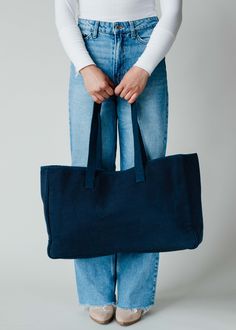 Blue, white and yellow mountain scene tote Navy "ROAD TRIP" textured text on the front Measures 11" x 20" x 6" 100% Cotton Lining: 100% Polyester Blue Canvas Bags For Weekend, Blue Canvas Weekend Bag, Navy Cotton Tote Bag, Blue Cotton Canvas Bag For Weekend, Blue Canvas Tote Bag For Weekend, Blue Tote Canvas Bag For The Weekend, Navy Cotton Travel Bag, Blue Canvas Bag With Large Capacity For Weekend, Blue Tote Bag For Weekend