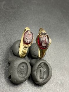 The Lot of Total 2 Beautiful Bronze Ring With Unique Intaglio Seal Stamp Engraved (Carved)On Garnet Stone A Human Figure Probably From Ancient Achaemenid Empire Civilizations. Originated From Central Asia. The Ring Intaglio Is Imprinted On Wet Clay For Better View In The Pictures . Rare Ancient Bronze Jewelry Ring . Best Item For Collections and Study . Fast and Free Shipping World Wide. Antique Etched Rings For Ceremonial Occasions, Traditional Carved Ceremonial Rings, Ceremonial Oval Intaglio Ring, Traditional Carved Rings For Ceremonial Occasions, Ancient Oval Engraved Jewelry, Traditional Ceremonial Intaglio Jewelry, Traditional Etched Ceremonial Rings, Traditional Etched Rings For Ceremonial Occasions, Ancient Style Carved Rings Gift