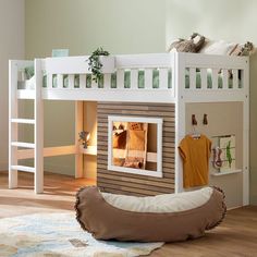 a bunk bed that is in the middle of a room with a dog on it