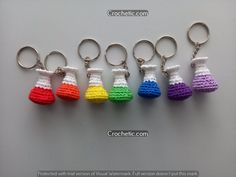 four crocheted key chains with different colors