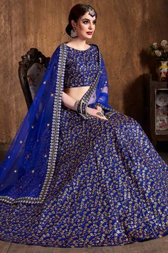 Product Features: Color: Royal Blue Lehenga Fabric: Raw Silk Blouse Fabric: Raw Silk Dupatta Fabric: Soft Net Work: ZARI AND SEQUINS HEAVY EMBROIDERY WORK Ocassion: Designer Embroidery Work Wash Care: Dry Clean Package Contain: 1 Lehenga, 1 Blouse And 1 Dupatta Prodcut Type: Lehenga Set Disclaimer: There will be slight difference in digital to actual image Punjabi Wedding Lengha, Silk Lehenga Designs, Royal Blue Lehenga, Silk Lehenga Choli, Raw Silk Lehenga, Wedding Dress Outfit, Bollywood Lehenga, Blue Lehenga, Lehenga Style