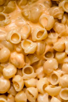 macaroni and cheese is being cooked in a pan