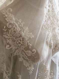 Ivory Alencon Lace Fabric Floral Pearl Beaded Sequined Wedding Lace Fabric 55 Inches Wide 1 Yard White Fitted Bridal Belt For Ceremony, Fitted Lace Bridal Belt For Ceremony, White Bridal Belt For Bride, Elegant Wedding Embroidered Fabric With Lace Trim, Lace Bridal Belt For Ceremony, Cream Wedding Dress With Delicate Lace, Cream Lace Wedding Dress For Bride, Cream Wedding Dress For Mother Of The Bride, Elegant Cream Tulle Fabric For Wedding