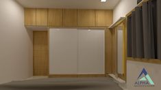 an empty room with wood paneling and white walls