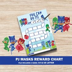 the pj masks reward chart is displayed on a wooden table