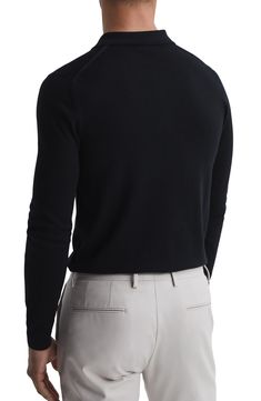 Fine-gauge wool provides luxe comfort in a trim polo knit with long sleeves that layers easily and looks splendid on its own. 26 1/2" length (size Medium) Point collar Long sleeves 100% wool Dry clean or hand wash, dry flat Imported Elegant Business Tops For Winter, Fitted Cashmere Polo Sweater In Fine Knit, Fitted Cashmere Polo Sweater With Fine Knit, Classic Long Sleeve Sweater For Formal Occasions, Fitted Fine Knit Cashmere Polo Sweater, Cashmere Turtleneck For Work, Fitted Fine Knit Sweater For Business Casual, Fitted Cashmere Top For Business Casual, Fine Knit Fitted Sweater For Business Casual