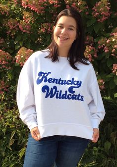 Kentucky Wildcats Womens White Corded Boxy Crew Sweatshirt - 20830466 Retro Oversized Tops For Game Day, Oversized Retro Top For Game Day, Collegiate Tops With Team Name, College Retro Sweatshirt, Collegiate Crew Top For Game Day, Varsity Crew Top For Fan Gear, Crew Neck Tops With Lettering For Fans, Crew Neck Tops With Lettering For Fan Gear, Retro Relaxed Fit Tops For Game Day