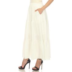 Elevate your fashion game with this flowy and effortlessly chic skirt. This maxi skirt from White Mark boasts a pleated design that adds texture, movement, and a touch of sophistication to your look. Dress it up or down as this skirt is incredibly versatile. Pair it with a tucked in blouse and heels for a sophisticated look or go for a more relaxed vibe with a tucked in tee and sandals and pair it with a jacket on chilly days. It’s perfect for various occasions and style preferences. Maxi Skirt Fall, Chic Skirt, Maxi Skirt Style, Tiered Maxi Skirt, Chic Skirts, Maggy London, Fall Skirts, White Mark, Toddler Girl Outfits