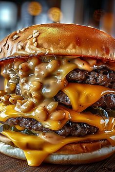 a cheeseburger with lots of toppings sitting on top of a wooden table