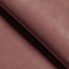 a close up shot of a pink fabric