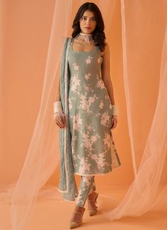 Our Dusty Green White Floral Printed Straight Suit includes a chanderi top, chanderi bottom, and a chanderi dupatta. Embroidery is present on this style using print and stone work. Like all of our pieces, this piece is made in India and checked by hand to ensure high quality. Sleeveless Suit Design, Suit Designs Indian Style Neck, Sleeveless Kurti Designs, Straight Kurti Designs, Suit Designs Indian Style, Suit Neck Designs, Kurti Designs Latest, Dusty Green