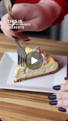 someone cutting into a piece of cheesecake with a knife and fork