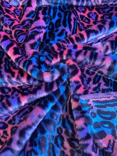 Leopard Faux Fur Animal Short Pile Fur Fabric Short Pile Fur Fabric By The Yard Introducing the Faux Fur Animal Short Pile Fur Fabric, a vibrant and luxurious material perfect for your DIY projects. This fabric boasts a stunning Neon Leopard pattern, where bold, colorful rainbow and neon hues combine to create a visually striking and playful design. The leopard print adds a touch of wild elegance, making it a standout choice for fashion-forward creations. Measuring 58 inches wide, this fabric is sold by the continuous yard, ensuring you have ample material for larger projects. The short pile fur is not only eye-catching but also incredibly soft and plush, providing a delightful tactile experience. Whether you're crafting clothing, accessories, or home decor, this fabric promises to add a p Fur Animal, Leopard Shorts, Neon Printing, Fur Fabric, Faux Fur Fabric, Fur Fabrics, Colorful Rainbow, Black Leopard, Clothes Crafts