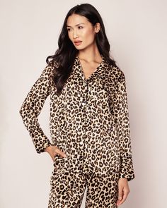 Indulge in the epitome of luxury with our limited-edition, leopard print pajamas crafted from sumptuous 100% Mulberry Silk. This print combines classic elegance with cool-girl charm, ensuring a night of unparalleled comfort and chic sophistication. The quintessential, timeless pajama silhouette that always feels fresh: 22mm Silk, supple elastic waist, single piping detail at collar, breast pocket, and pajama pant cuff and practical pockets. As effortless and comfortable as luxury sleepwear gets. Leopard Pajamas, Luxury Sleepwear, Pajama Pant, Jennifer Fisher, Cuffed Pants, Print Pajamas, Veronica Beard, Mulberry Silk, Classic Elegance