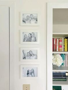 a white book shelf with pictures on it