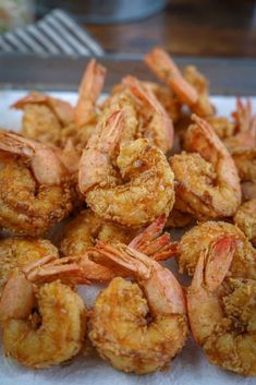 fried shrimp on a white plate ready to be eaten