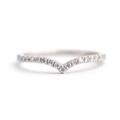 a white gold wedding band with diamonds