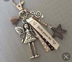 a key chain that has some charms on it