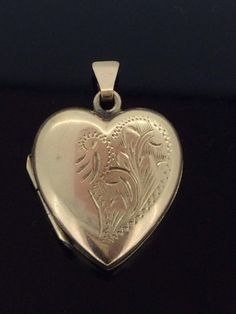 Antique Edwardian Hinged Heart Locket in 9CT hallmarked gold in excellent Condition this pendant is very elegant embossed front patterned and measuring 2.5cm x 1.8cm All pieces are unique I aim to provide you with a 5 star service and 100% customer satisfaction is my priority. All my items are vintage and pre owned so at times they will have signs of age but I try my very best to describe them with accuracy. Your purchase will be carefully packed to protect it. If you wish it wrapped as a gift for someone then do let me know please. SHIPPING U.K.POSTAGE: FREE SHIPPING  Royal Mail Special delivery INTERNATIONAL SHIPPING  FREE SHIPPING WORLDWIDE  ROYAL MAIL I SHIP TRACKED SIGNED AND INSURED BUT IT DOES NOT COVER CUSTOM CHARGES IN YOUR COUNTRY. Antique Heart-shaped Engraved Jewelry, Ornate Heart-shaped Jewelry For Formal Occasion, Ornate Heart-shaped Formal Jewelry, Classic Double Heart Engraved Jewelry, Classic Engraved Double Heart Jewelry, Heart-shaped Engraved Jewelry For Formal Occasions, Traditional Gold Heart-shaped Jewelry, Traditional Heart-shaped Yellow Gold Jewelry, Traditional Gold Heart Jewelry