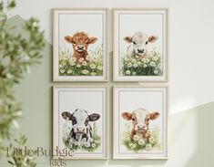 three pictures of cows are hanging on the wall in front of a potted plant